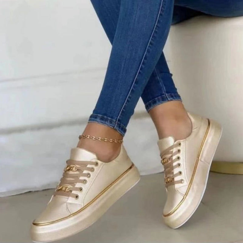Kate – Modische Sneaker mit goldenen Akzenten