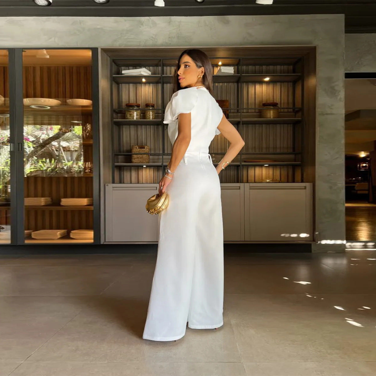 Sofia – Eleganter Designer-Jumpsuit mit Cut-Outs und Goldknöpfen