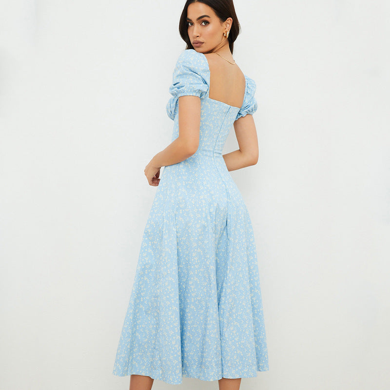 Lucia - Vestido floral midi con mangas abullonadas